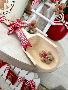 a wooden tray with gingerbread man on it