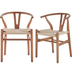 two wooden chairs sitting next to each other