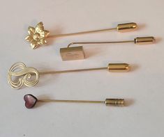 Lot of vintage gold tone hat stick pins good condition measures 2 1/2" long Hat Pins Vintage, Gold Clips, Stick Pins, Hat Pins, Vintage Gold, Caps Hats, Accessories Hats, Gold Tones, Ships