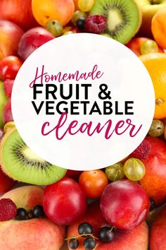 the words homemade fruit and vegetable cleaner are surrounded by fresh fruits, including kiwis