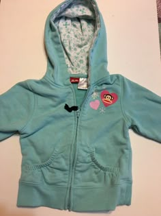 Paul Frank Hooded Sweatshirt Girls Size 4T Light Blue Long Sleeve. Good Condition. Shipped with USPS First Class Package. Length 14”. Sleeves shoulder seam to cuff 14”. Zipper front. 2 front pockets. Paul Frank Monkey Clothes, Cute Y2k Clothes, Cute Blue Hoodie Top, Paul Frank Clothes, H20 Outfits, 2000s Hoodie, Sweatshirt Outfits, Thrifted Clothes, Mcbling Fashion