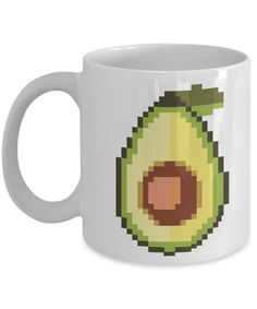 an avocado pixel art coffee mug with the image of an avocado on it