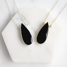 The sweetest and most unique piece for your jewelry collection. This necklace can be layered, or worn alone. GEMSTONE: Black Onyx SIZE: 1.4" long CHAIN: 18" long 14k gold filled/sterling silver CLOSURE: Lobster clasp Long Statement Earrings, Black Onyx Jewelry, Stone Statement Necklace, Onyx Jewelry, Chain Extenders, Teardrop Necklace, Jewelry Case, Long Chain, Stone Necklace