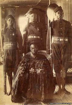 an old black and white photo of men in uniforms