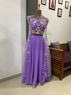 Full Stitched Lavender Floral Embroidered Designer Lehenga - we will make it according to your requirements. It's perfect for your functions. And makes it memorable. Fabric and Work Lehenga Choli: Lehenga and Choli is made of georgete  fabric. The floral design on the choli is made with silk threads, shades of beads and sequins. It lined with crape and inside finished with soft cotton fabric. Overcoat: A beautiful net overlay embellished with floral work enhance the beauty and elegance of the en Purple Anarkali With Floral Embroidery, Fitted Lavender Embroidered Sets, Purple Dress With Floral Embroidery And Traditional Drape, Embroidered Fitted Lavender Sets, Purple Floral Embroidered Dress With Traditional Drape, Purple Dress With Floral Embroidery In Traditional Drape, Fitted Lavender Lehenga With Intricate Embroidery, Fitted Lavender Traditional Wear With Resham Embroidery, Lavender Fitted Traditional Wear With Resham Embroidery