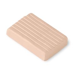 an image of a beige object on a white background that looks like it is made out of foam