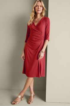 The beloved wrap dress has always been a style icon and this faux wrap design has long been a Soft favorite, now in a shorter length. Shirring detail at waist creates the perfect hourglass figure. Elbow-length sleeves. Elegant V-neck Dress With Surplice Neckline For Fall, Formal Knee-length Faux Wrap Dress, Elegant Ruched Wrap Dress For Work, Chic Ruched Wrap Dress For Formal Occasions, Chic Formal Ruched Wrap Dress, Formal Midi-length Faux Wrap Dress, Draped Wrap Dress For Workwear, Formal Midi Dress With Faux Wrap And Surplice Neckline, Elegant Midi-length Ruched Wrap Dress