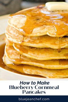 how to make blueberry cornmeal pancakes on a plate with syrup and butter