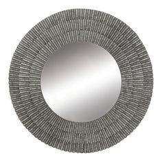 a round mirror that is made out of wood and woven with grey stripes on it