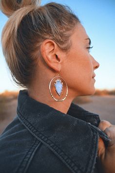 "Opalite is a purity stone that stimulates joy and positive vibrations. The powder blue white color feels angelic. These handmade, gold hammered hoops are unique and make you feel like you own every room you step into. ▲ Opalite gemstone arrowheads electroplated in 14k gold ▲ 2\" hammered gold plated hoops ▲ Drop length 2.5\" ▲ Weight: 1/4 oz ▲ Hypoallergenic ▲ Comes gift-ready in a beautiful white jewelry box ▲ Handmade just for you ✦ N A T U R A L - V A R I A T I O N ✦ Please note, these are r Positive Vibrations, Dangle Earrings Boho, Bride Earrings, Hammered Gold, Handmade Gold, Etsy Earrings Dangle, Blue Earrings, Polish Jewelry, Jewelry Earrings Hoops