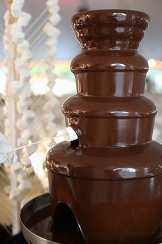 a chocolate fountain sitting on top of a pan