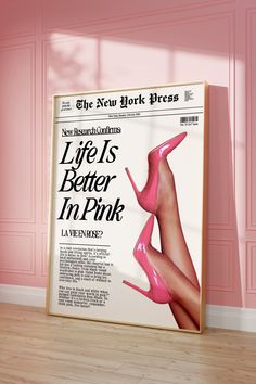 an advertisement for the new york press with high heels on display in front of a pink wall