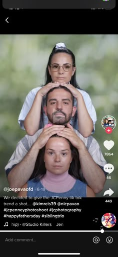 a man holding a woman's head in front of her face