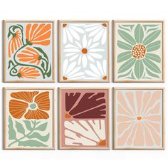 four framed flower prints in various colors and sizes, each with different designs on them