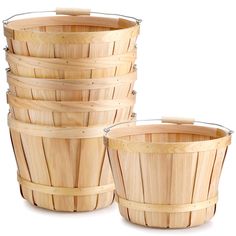 four wooden buckets stacked on top of each other