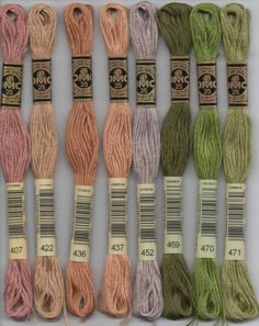 six skeins of different colors of yarn