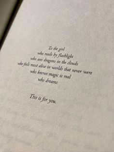 an open book with the words to the girl who reads by flashlight