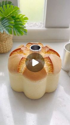 a video demonstrating how to make a bread bun with the help of an appliance