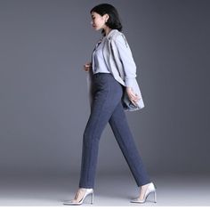 The Casual Straight Fit High Waist Female Pants are the perfect blend of comfort and style. Designed with a straight fit, these pants are both flattering and functional. The high waistline creates a flattering silhouette, while the casual straight leg offers ample room for movement. Premium polyester is used in their making and these pants are ideal for all seasons. Specification: Season: All season Pant Style: Pencil Pants Front Style: Flat Waist Type: High Pattern Type: Solid Decoration: Butto Warm Pants, Formal Pants, Pencil Pants, Mens Dress Pants, Office Ladies, Women Pants Casual, Work Pants, Jeans Pants, Jeans Dress