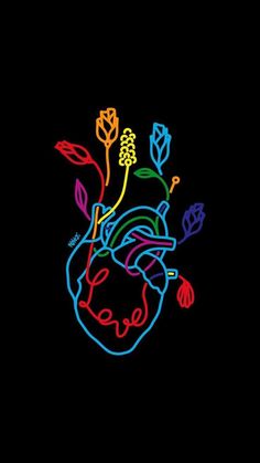 a neon drawing of a human heart with flowers and leaves in the center on a black background