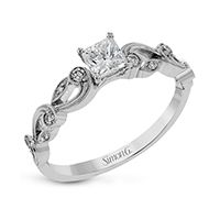 an engagement ring with a princess cut diamond