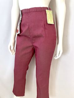 "Vintage Women's 60's NOS, Red, High Waisted, Cropped Pants, Petal Pushers by (M) These Ladies Pants come in a red cotton/nylon blend with a high waist and skinny leg fit, with a side metal zipper and single button closure. The fabric is light with two way stretch and has a slight sheen to the surface. 75% Cotton 25% Nylon Made in USA *These pants are NOS (new old stock) with all original tags attached. There is a snag in the fabric on the booty (photo #9). *If shipped within the US, these pants Retro Stretch Bottoms With Pockets, Retro Red Trousers, Fitted Full-length Red Bottoms, Red Fitted Full Length Bottoms, Vintage High Waist Stretch Pants, Vintage Stretch High-waisted Pants, Vintage Stretch Full-length Pants, Retro Red Bottoms For Spring, Vintage Stretch Full Length Pants