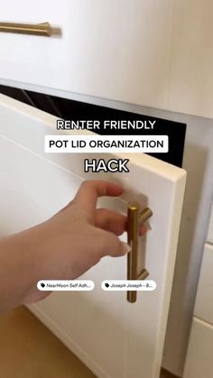 a person opening a door with the words'pot lid organization hack'on it