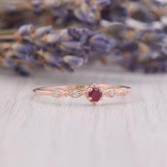 Small & dainty 14k rose gold antique victorian pink ruby engagement ring, Delicate minimalist art deco style ruby promise ring for her WE OFFER UNLIMITED PERIOD INSTALLMENTS PLAN This is a beautiful, stunning, feminine ring that works well for all occasions, styles, and ages. You will love it! Ring information: Main stone: Ruby Approximate size: 2.5mm Accent stones: Cubic zirconia Approximate size: 1.25mm (4 stones) Metal type: Gold Metal stamp: 14k Gold Installment Payments We offer install Blue Sapphire Promise Ring, Ruby Promise Ring, Engagement Ring Delicate, Minimalist Art Deco, Silver Promise Rings, Dainty Engagement Rings, Minimalist Engagement Ring, Promise Ring For Her, Pink Ruby