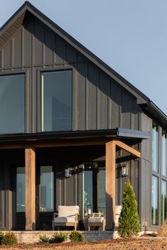 a large house with lots of windows on the side