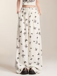 These wide-leg pants are designed to be both flattering and stylish, perfect for those looking to achieve a slimmer silhouette. The pants feature an all-over butterfly print adorned with rhinestone embellishments, adding a touch of sparkle and elegance. The design is full of creativity, making these pants not only cute but also youthful and refreshing.  Please note that the price includes one pair of pants only.   	 		 			Size 			S 			M 			L 		 		 			Length 			104 			105 			106 		 		 			Waist Casual Summer Bottoms With Butterfly Print, Casual Butterfly Print Bottoms For Summer, Casual Bottoms With Butterfly Embroidery For Spring, Summer Cotton Bottoms With Butterfly Print, Decorated Pants, Thrift Flips, Steampunk Fashion Male, White Knit Top, Gothic Skirts