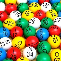 many different colored balls with numbers on them