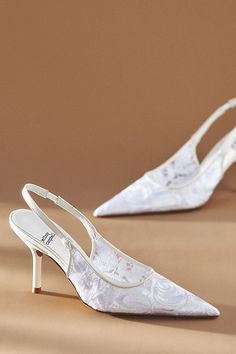 Jeffrey Campbell's Lofficele Heels strike a pose with the slingback silhouette completed by a pointed toe and kitten heel. | Lofficele Pointed-Toe Heels by Jeffrey Campbell in White, Women's, Size: 10, Leather at Anthropologie Small Heel Bridal Shoes, Pointy Bridal Shoes, White Bride Heels, Wedding Day Heels, Wedding Kitten Heels Bridal, White Lace High Heels, White Pointed Toe Kitten Heels, Short White Heels, Wedding Slingbacks