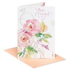 a greeting card with watercolor flowers and the words you're engaged on it