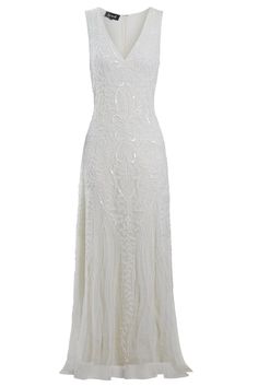 a white dress that is very long and has an intricate design on the front, with fringe