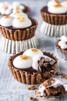 mini chocolate tarts with marshmallows on top