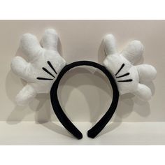 This Adorable Mouse Ears Headband Featuring The Iconic Mickey Mouse White Gloves Is A Must Have For Any Disney Fan! The Unisex Design Makes It Suitable For Both Adults And Children, And The One-Size-Fits-All Ensures A Comfortable Fit. Features An Extra-Wide Headband Covered With Black Plush Fabric, And Plush White Gloves With Embroidered Details. This Contemporary Collectible Will Never Go Out Of Style. The Black And White Color Scheme Is Perfect For Any Outfit, And The Hairband Is An Excellent Mickey Mouse Plush, Extra Wide Headband, Mouse Plush, Mouse Ears Headband, Ears Headband, Disney Fan, Black And White Color, Wide Headband, Embroidered Details