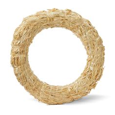 a wreath made out of straw on a white background