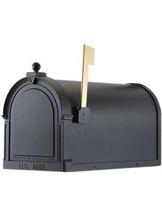 a black mailbox with a gold stick sticking out of it