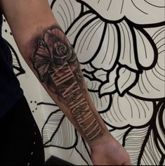 a person with a tattoo on their arm