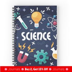 a spiral notebook with the words science on it and various items around it, including a light bulb