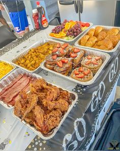 several trays of food on a table