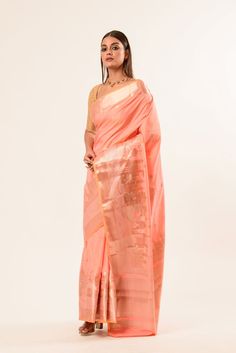 Coral Peach Katan Banarasi Silk Saree With Golden Temple Border - Anvi Couture Festive Peach Banarasi Silk Saree, Peach Saree With Zari Weaving, Peach Zari Work Traditional Wear For Festivals, Peach Saree With Zari Weaving For Diwali, Peach Traditional Wear With Zari Work For Festivals, Peach Saree With Zari Weaving For Wedding, Elegant Orange Katan Silk Saree, Peach Wedding Saree With Zari Weaving, Festive Peach Traditional Wear With Zari Weaving