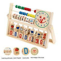 a wooden toy with letters and numbers on the front, and an image of a clock