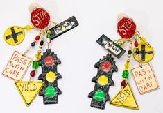 JD11202 Years ago when first saw Lunch at the Ritz earrings being worn by some of my customers, I thought what fun.  Now, some of their creations are mor important to me and one of my favorite earrings is the Stop Sign earrings.  I love them.  The clip earring are 3.5" long with five dangling signs.  The earring is light and comfortable to wear. Vintage Lunch, Stop Sign, The Ritz, Holiday Deals, Clip Earrings, Clip On Earrings, Art Inspo, Jewelry Earrings Dangle, Origami