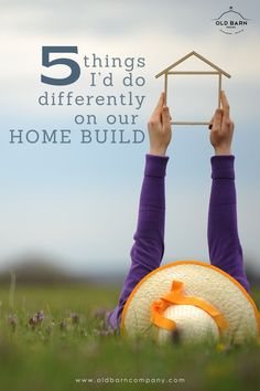 a person laying in the grass with their hands on top of a model house and text that reads, 5 things i'd do differently on our home build