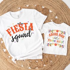 two t - shirts with the words fiesta squad on them sitting next to each other