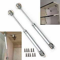 two stainless steel shower door handles with screws and bolts on the side of it