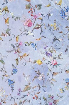 a blue background with colorful flowers and birds on it's side, all over