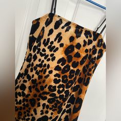 Indulge In Fierce Elegance With This Brand New, Never Worn Leopard Print Spaghetti Strap Cocktail Dress. With Its Bold And Captivating Design, This Dress Exudes Confidence And Sophistication, Making It The Perfect Choice For Any Special Occasion. Featuring A Flattering Silhouette And Crafted From High-Quality Materials, This Dress Offers Both Style And Comfort. The Playful Leopard Print Adds A Touch Of Glamour, While The Spaghetti Straps Add A Delicate And Feminine Charm. Whether You're Attendin Black Satin Mini Dress, Grey T Shirt Dress, Cream Mini Dress, Flower Pattern Dress, Black Skater Dress, Tunic Shirt Dress, White Bodycon, White Bodycon Dress, Green Mini Dress