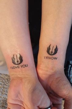 two people holding hands with tattoos on their arms that read i love you and i know